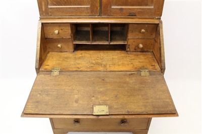 Lot 862 - George III oak and pine country bureau cabinet