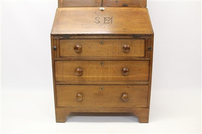 Lot 862 - George III oak and pine country bureau cabinet