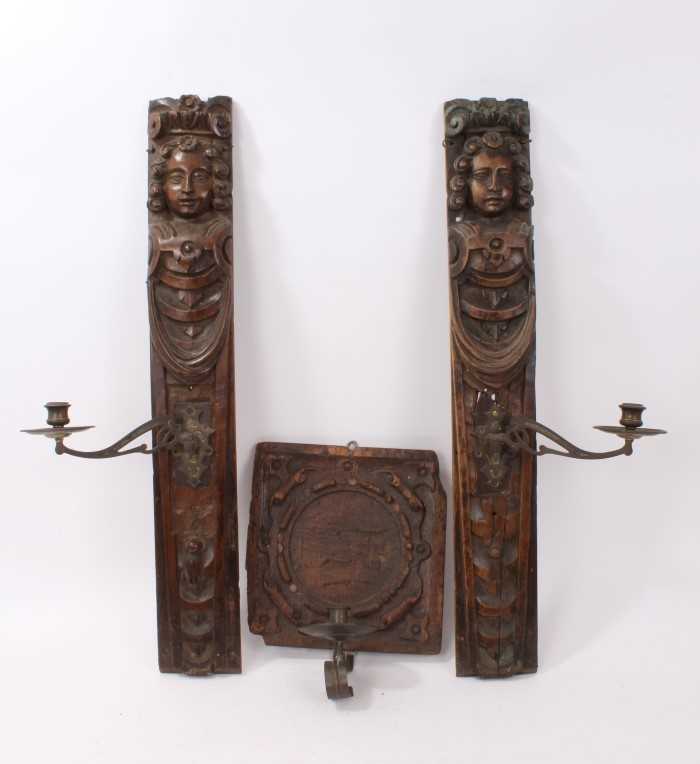 Lot 846 - Pair of 17th century carved walnut wooden panels converted to wall sconces