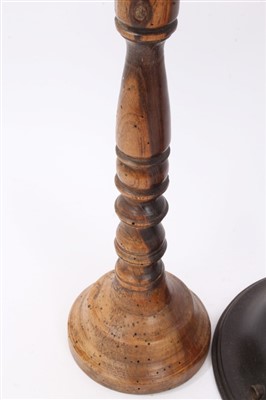 Lot 849 - 18th century lignum vitae candlestick