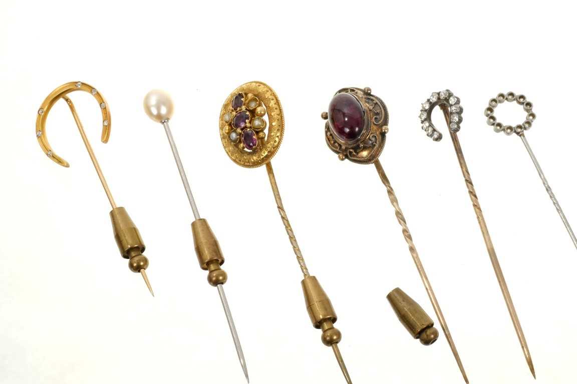 Lot 573 - Group of six antique stick pins