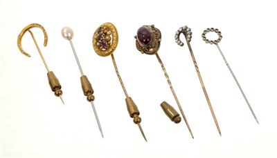 Lot 573 - Group of six antique stick pins