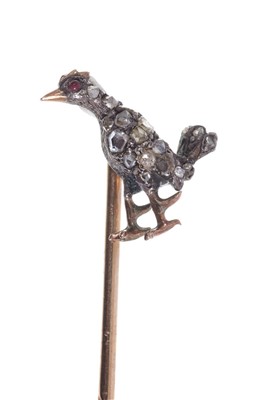 Lot 556 - Antique diamond novelty stick pin in the form of a cockerel, with red stone eye and pavé set rose cut diamonds in silver setting, with gold beak, plumage and feet