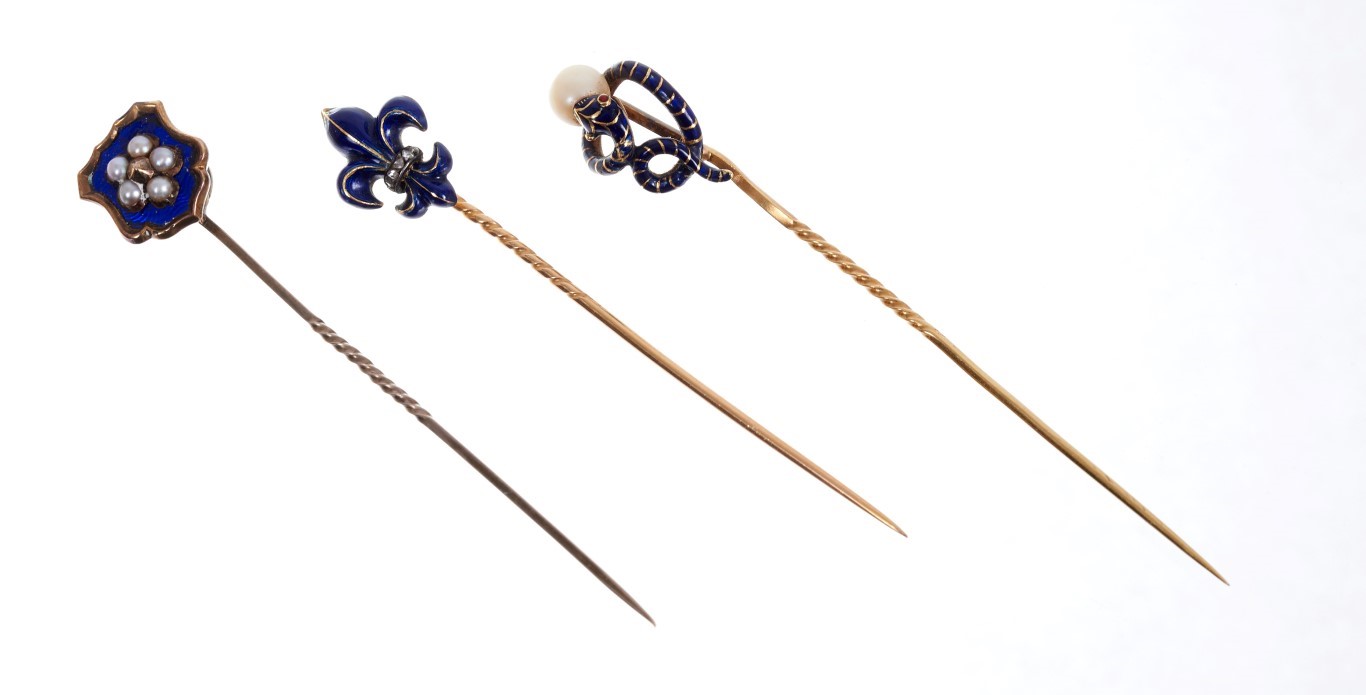 Lot 561 - Victorian enamel and pearl stick pin in the