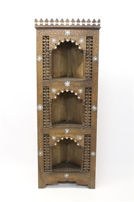 Lot 1508 - 19th century Moorish teak and mother of pearl; inlaid standing corner cupboard