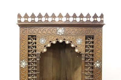 Lot 1508 - 19th century Moorish teak and mother of pearl; inlaid standing corner cupboard