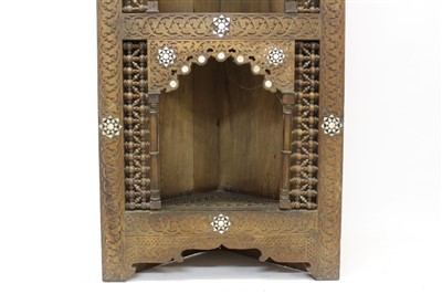 Lot 1508 - 19th century Moorish teak and mother of pearl; inlaid standing corner cupboard