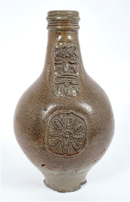 Lot 200 - 17th century Rhenish stoneware Bellarmine bottle with string collar, 23cm high