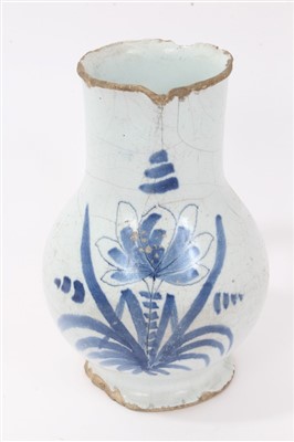Lot 201 - 18th century Dutch Delft blue and white tin glazed pottery jug, 20.5cm high