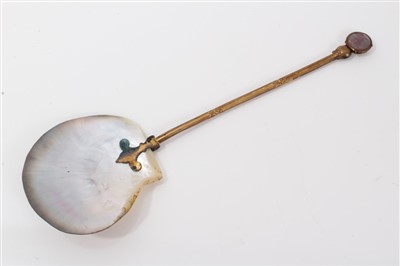 Lot 868 - Unusual mother of pearl gilt spoon with moon face finial