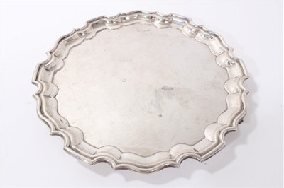 Lot 248 - George V silver salver of circular form, Walker & Hall