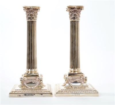 Lot 426 - Pair Victorian Corinthian Column candlesticks with ram-head and swag decoration