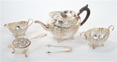 Lot 427 - Victorian three piece tea set - comprising teapot with embossed scroll and foliate decoration