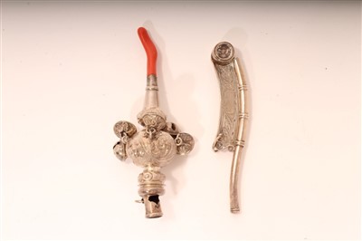 Lot 403 - Victorian silver rattle with embossed foliate decoration and a silver bosun's whistle