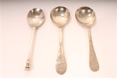 Lot 405 - Two Continental silver spoons and white metal seal top spoon (3)