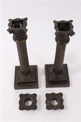 Lot 133 - Pair of 19th century bronze Corinthian column candlesticks