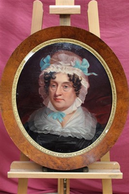 Lot 125 - 19th century English school oval oil on canvas laid on board - portrait of a lady wearing a bonnet, in oval frame, 47cm x 40cm