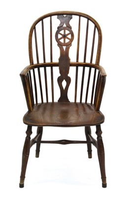 Lot 1509 - 19th century ask and elm wheelback Windsor chair