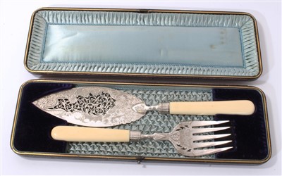 Lot 412 - Pair Victorian silver plated fish servers with pierced and engraved foliate decoration