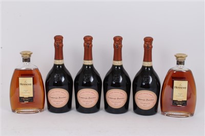 Lot 796 - Champagne - four bottles, Laurent-Perrier Cuvee Rose Brut, together with two bottles of Hennessy Cognac (6)