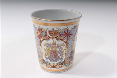 Lot 43 - King George V Coronation 1911 commemorative enamel beaker, 9.5cm high and Royal Doulton - King Edward VII Coronation 1902 commemorative tall beaker, 15.2cm high (2)