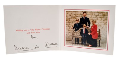 Lot 47 - TRH The Prince and Princess of Wales - signed 1991 Christmas card with twin gilt embossed Royal ciphers to cover, colour photograph of the happy Royal Couple with their sons all wearing blazers