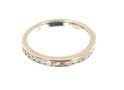 Lot 709 - 18ct white gold eternity ring