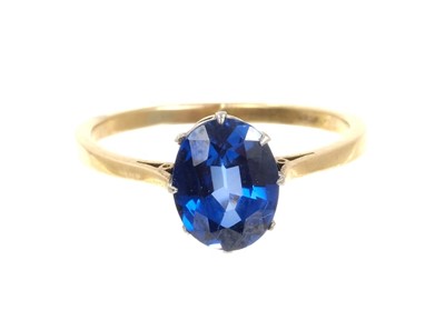 Lot 712 - Blue stone ring in claw setting on gold shank