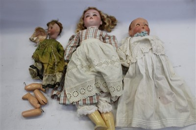 Lot 2812 - Three Dolls - including Schoenau & Hoffmeister 1909 3 1/2 bisque head with blue sleeping eyes, open mouth with top four teeth showing.