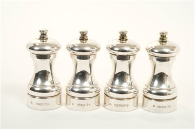 Lot 205 - Fine quality set of four contemporary silver salt and pepper grinders