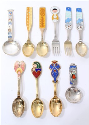 Lot 267 - Six Danish enamelled silver Christmas spoons and two forks by Anton Michelsen, Andersen and Tostrup