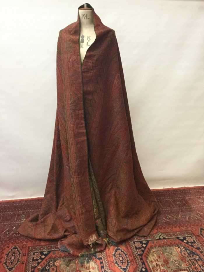 Lot 3052 - Victorian fine woven wool paisley shawl with red centre and fringing.