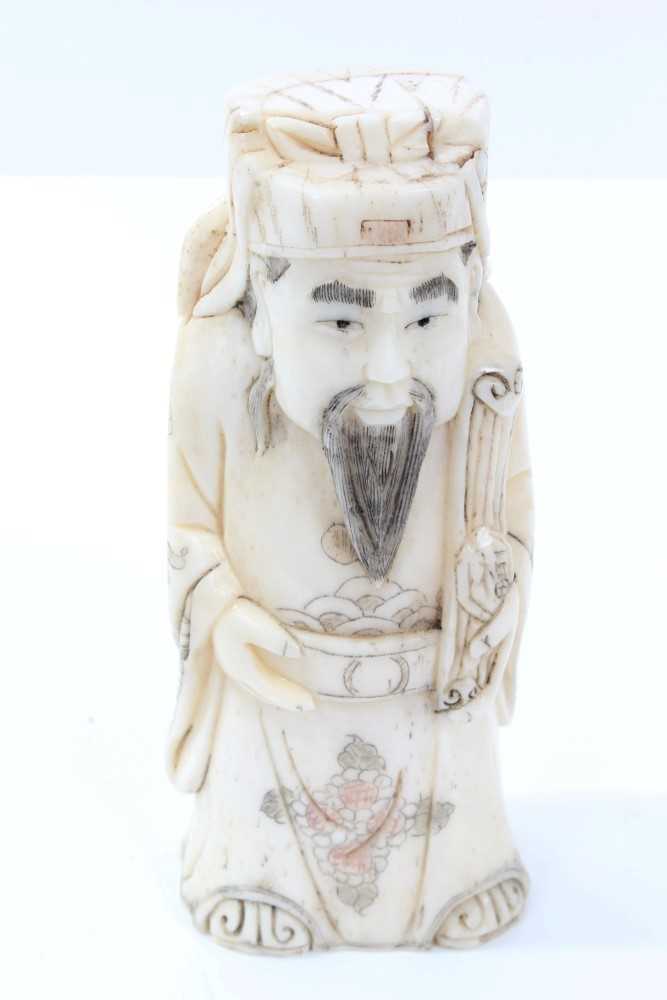 Lot 732 - Chinese carved ivory deity figure depicted
