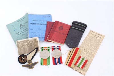 Lot 502 - Second World War ephemera relating to 165868 F/LT H. Thomas R.A.F., including Service and Release book, cloth Navigators Badge and War and Defence Medals