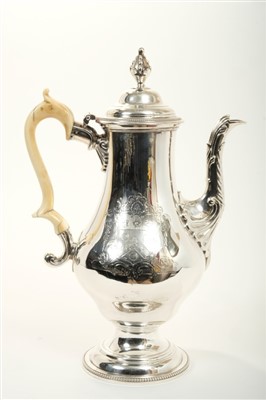 Lot 233 - George III silver coffee pot of ogee form