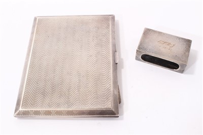Lot 246 - 1920s silver cigarette case of rectangular form and a 1930s silver matchbox holder