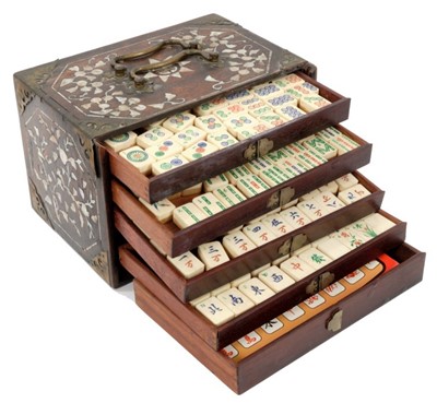 Lot 653 - Antique Chinese teak and mother of pearl inlaid cased mahjong set