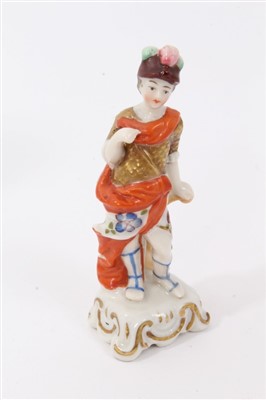 Lot 157 - 18th century Furstenberg plate and a Naples figure