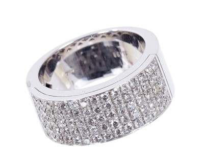 Lot 411 - Diamond ring with a wide band of brilliant cut diamonds, weight approximately 0.94cts in total