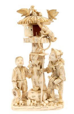 Lot 700 - Late 19th century Japanese carved ivory figure group