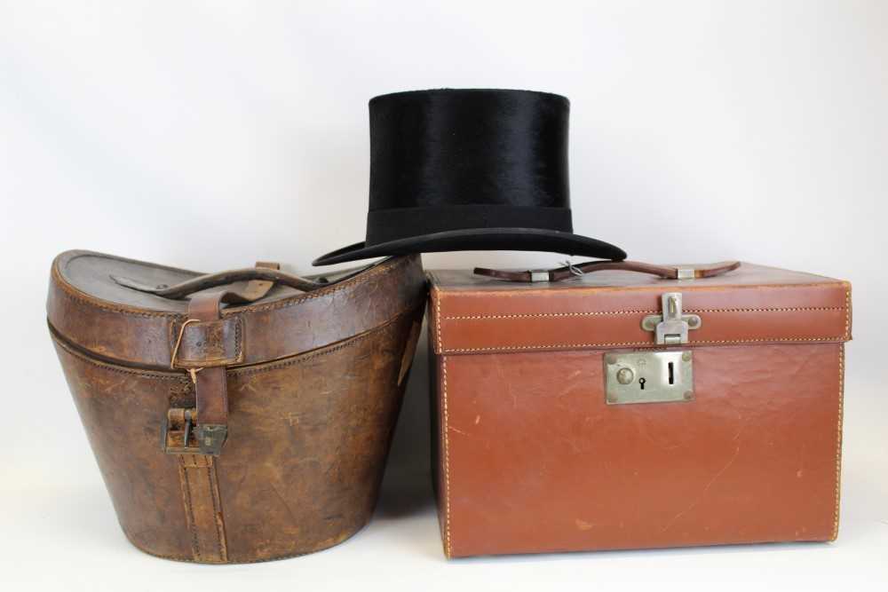 Lot 3057 - Gentleman's vintage black top hat by Christy's London retailer Dudley Beck Hatter Chester in fitted leather hat case with red silk lining.  Plus a grey top hat 'The Woodrow' in a square leather fit...