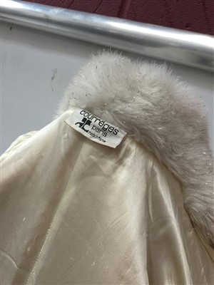 Lot 3072 - 1960s Space Age fashion by designer Courreges.  White and silver faux fur coat.