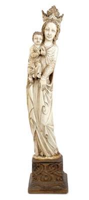 Lot 698 - Fine quality 18th century Indo-Portuguese ivory of Madonna and Christ child carved from whole tusk