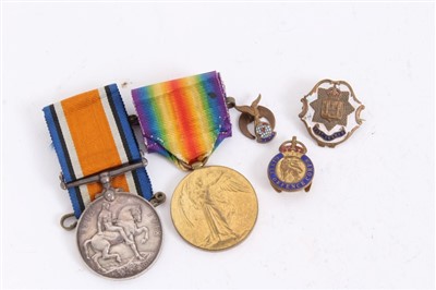 Lot 500 - First World Medal pair comprising War and Victory medals named to 36694 CPL. H.H. Rawkins. R. FUS. together with three military badges