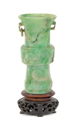 Lot 657 - Chinese carved spinach jade of a Gu-form vessel