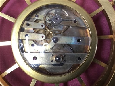 Lot 1266 - 19th century travelling clock with watch movement in the form of a gilt metal carriage wheel