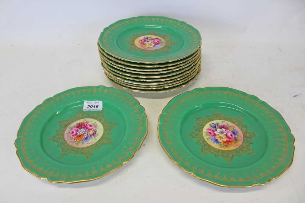 Lot 2016 - Twelve Royal Worcester cabinet plates with central hand painted floral decoration signed S. Stanley with green and gilt borders. (12)