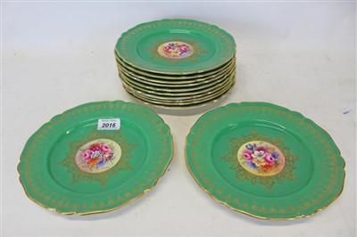 Lot 2016 - Twelve Royal Worcester cabinet plates with central hand painted floral decoration signed S. Stanley with green and gilt borders. (12)