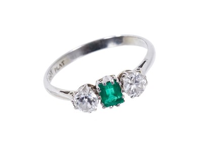 Lot 410 - Emerald and diamond three stone ring