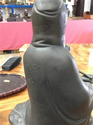 Lot 801 - Chinese bronze figure of Guanyin - seal mark to base